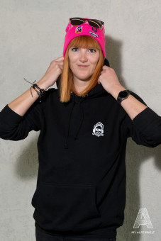 Black hoodie with small Hannes Alm logo on the front left
