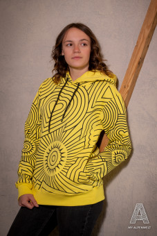 Yellow hoodie with black alpine world pattern all over the sweater